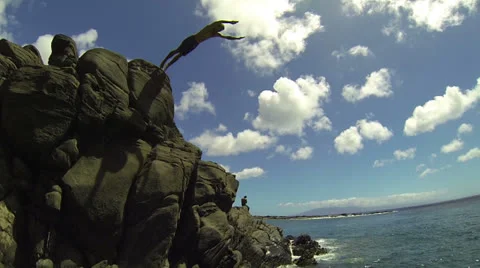 Cliff Dive Into Ocean (Slow Motion) Stock Footage 25535819