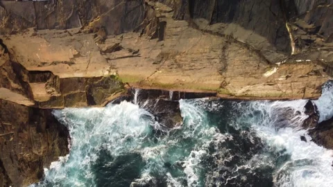 Cliff Edge to Land Stock Footage 246232894