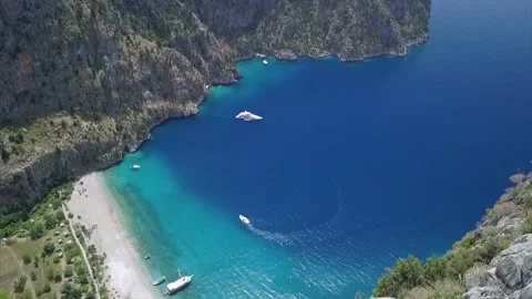 Cliff edge sheer fall mountain, in Butterfly Valley Fetiye Turkey Stock Footage 155297802