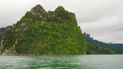 The Cliff Emerge On Water Surface Stock Footage 65139190