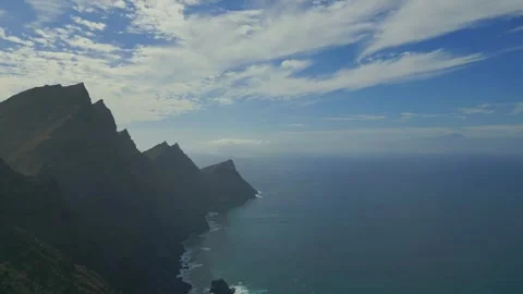 A cliff falling into the blue ocean. Dragon's Tail. Stock Footage 266253313
