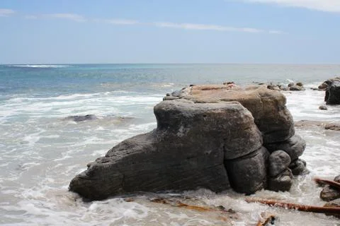 Cliff going into the ocean Stock Photos