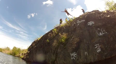 Cliff jump front flip Stock Footage 27692212