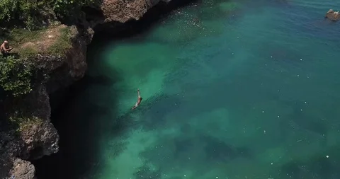 Cliff Jump Gainer Drone Shot Bali Stock Footage 106787174