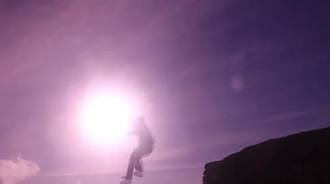 Cliff jump silhouette 動画素材 47779057