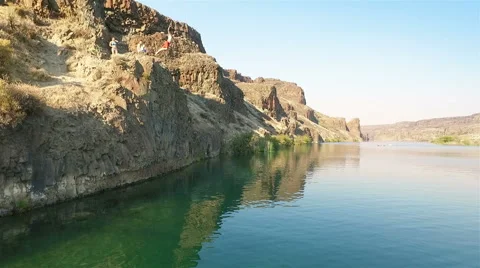 Cliff jumping. Aerial shot. Stock Footage 65966907