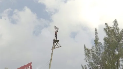 Cliff jumping at Ricks Cafe in Negril, Jamaica. Filmed in Super Slow Motion. Stock Footage 73138981