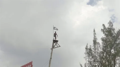 Cliff jumping at Ricks Cafe in Negril, Jamaica. Filmed in Super Slow Motion. Stock Footage 73139042