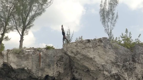 Cliff jumping at Ricks Cafe in Negril, Jamaica. Filmed in Super Slow Motion. Stock Footage 73139071