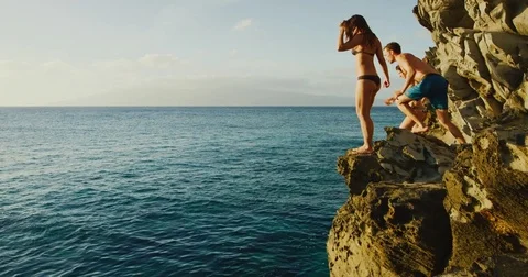 Cliff Jumping at Sunset Stock Footage 84908073