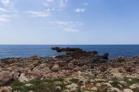 Cliff in the middle of the sea Stock Photos