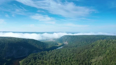 Cliff mountain area, a river flows downhill in the gorge. 스톡 동영상 114870524