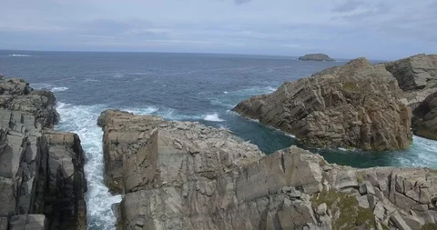 CLIFF OCEAN AND LIGHTHOUSE BY DRONE Stock Footage 90759078