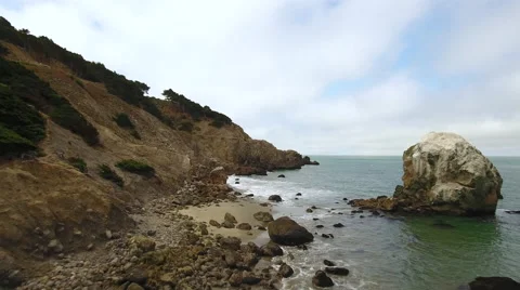 Cliff Ocean Drone Flying Backwards Waves Beach Stock-Footage 67157524