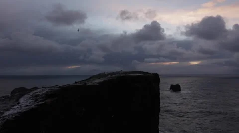 Cliff overlooking the North Atlantic Ocean at Sunset Stock Footage 47202094
