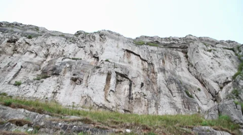 Cliff POV - Looking up from below and searching Stock Footage 37798592