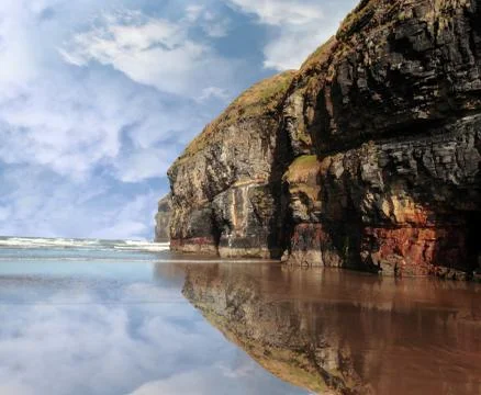 Cliff reflection on ballybunion beach Stock Photos