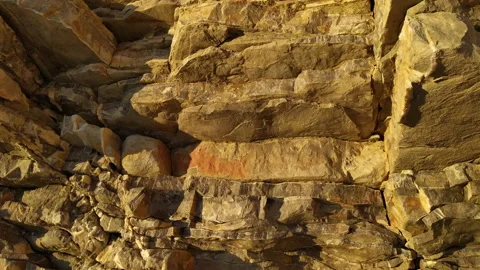 Cliff - rugged dipping sedimentary rock ... | Stock Video | Pond5