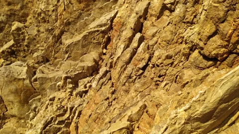 Cliff - rugged dipping sedimentary rock ... | Stock Video | Pond5