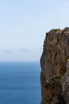 Cliff sea with sky in background Stock Photos
