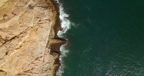 Cliff In The Sea With Smooth Rocks Stock Footage 108857868