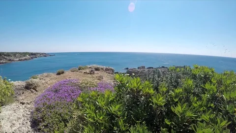 Cliff side view of popular hidden beach in Rhodes Greece. Stock Footage 116456437