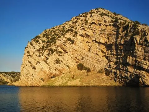 Cliff on sunset Stock Photos