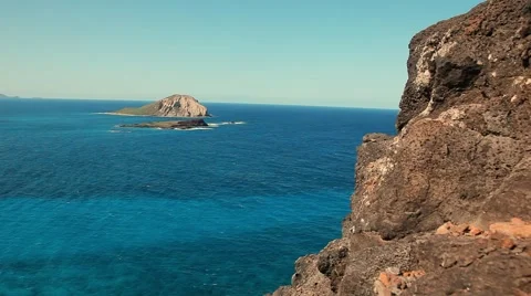 Cliff Surrounded By Turquoise Water Vidéo 43858745