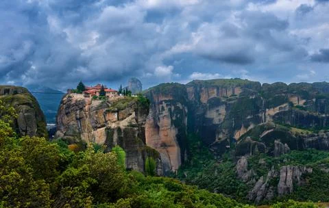 Cliff-top Eastern Orthodox monastery of Holy Trinity or Agia Triada in famous Stock Photos