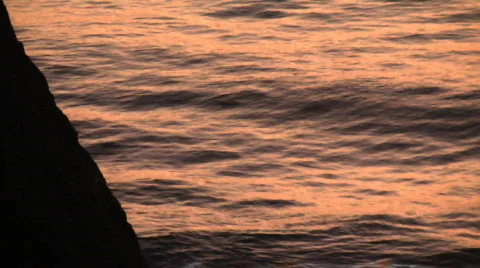 Cliff water sunset Stock-Footage 557195