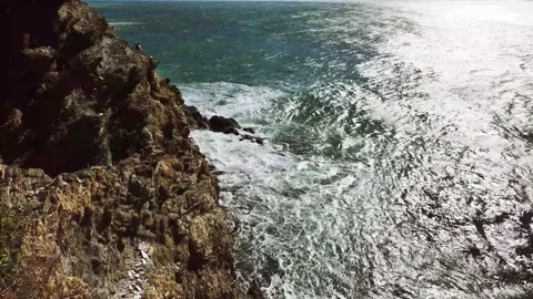 Cliff with waves Stock Footage 332793913