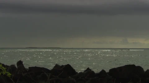 Cliffs along the shore. Dark clouds above the sea. Stock Footage 39484156