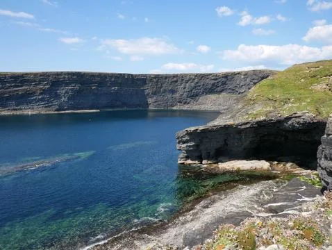 Cliffs and the Atlantic ocean background, rocks and laguna, beauty in natur.. Stock Photos