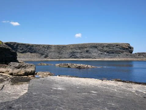 Cliffs and Atlantic ocean, clouds, rocks and laguna, beauty in nature. Vaca.. 스톡 사진