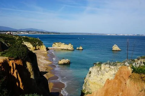 Cliffs and Atlantic ocean in Lagos, Portugal Stock Photos