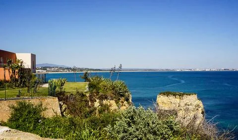 Cliffs and Atlantic ocean in Lagos, Portugal Stock Photos