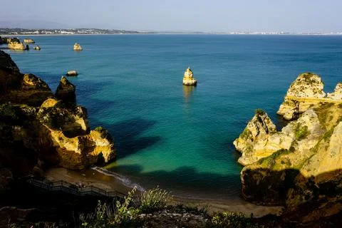 Cliffs and Atlantic ocean in Lagos, Portugal Stock Photos
