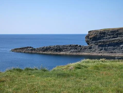 Cliffs and Atlantic ocean, rocks and laguna, beauty in nature. Summer vacat.. Stock Photos