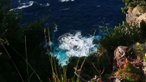 Cliffs and Atlantic ocean view from the observation deck Vigia das Baleias Stock Footage 123999657