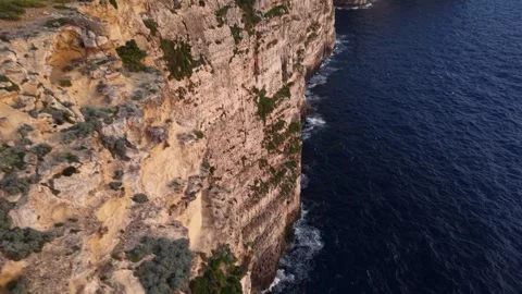 Cliffs and azure waters of Malta from an aerial perspective Stock Footage 306849078