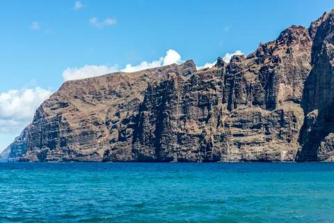 Cliffs and  beach on the Atlantic Ocean Coastline, Los Gigantes, Tenerife, Ca Stock Photos
