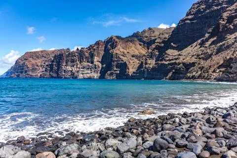 Cliffs and  beach on the Atlantic Ocean Coastline, Los Gigantes, Tenerife, Ca Stock Photos
