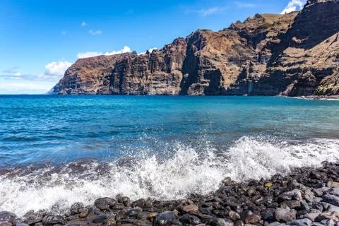 Cliffs and  beach on the Atlantic Ocean Coastline, Los Gigantes, Tenerife, Ca Stock Photos