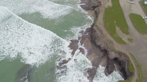Cliffs and Crashing Waves Overhead View Aerial Drone Footage Stock Footage 172014115