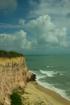 Cliffs and desert beach Stock Photos