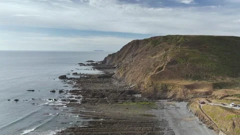 Cliffs and Farms over North Devon and Cornwall Coastpath Border from a drone, Stock Footage 342187670