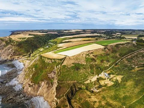 Cliffs and Fields over Welcombe Mouth Beach from a drone, North Devon and Stock-Fotos