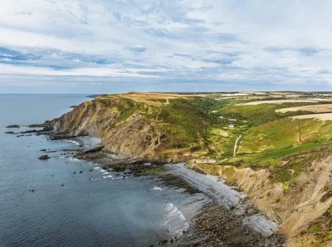 Cliffs and Fields over Welcombe Mouth Beach from a drone, North Devon and Stock-Fotos
