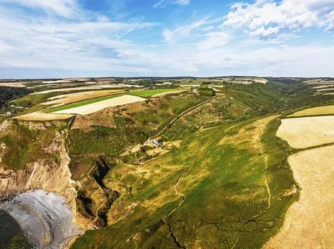 Cliffs and Fields over Welcombe Mouth Beach from a drone, North Devon and Stock-Fotos