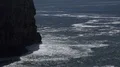 Cliffs and foamy seawaves at Portugal southern tourism spot Sagres 4k 4k or 4k+ Resolution